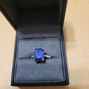 Blue stone ring.